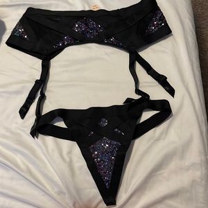 Matching thong and garter belt/ Victoria secret
